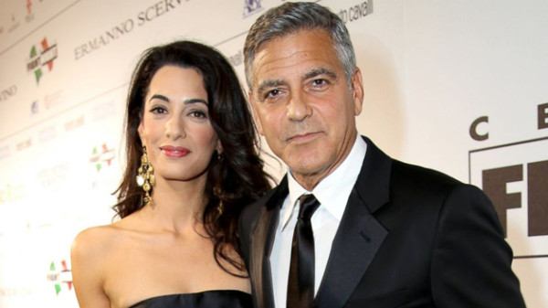 Esperan Clooney y Amal niño y niña