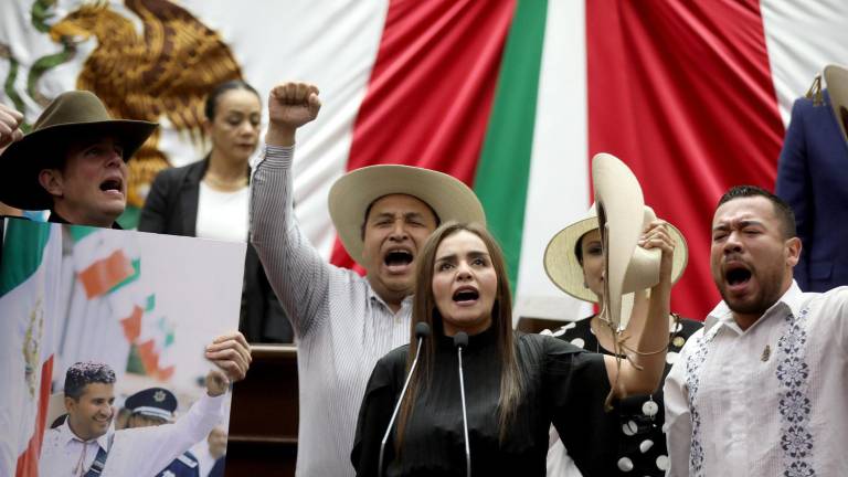 Grecia Quiroz García asumió como Presidenta Municipal de Uruapan en el Congreso de Michoacán. Grecia Quiroz García asumió como Presidenta Municipal de Uruapan en el Congreso de Michoacán.