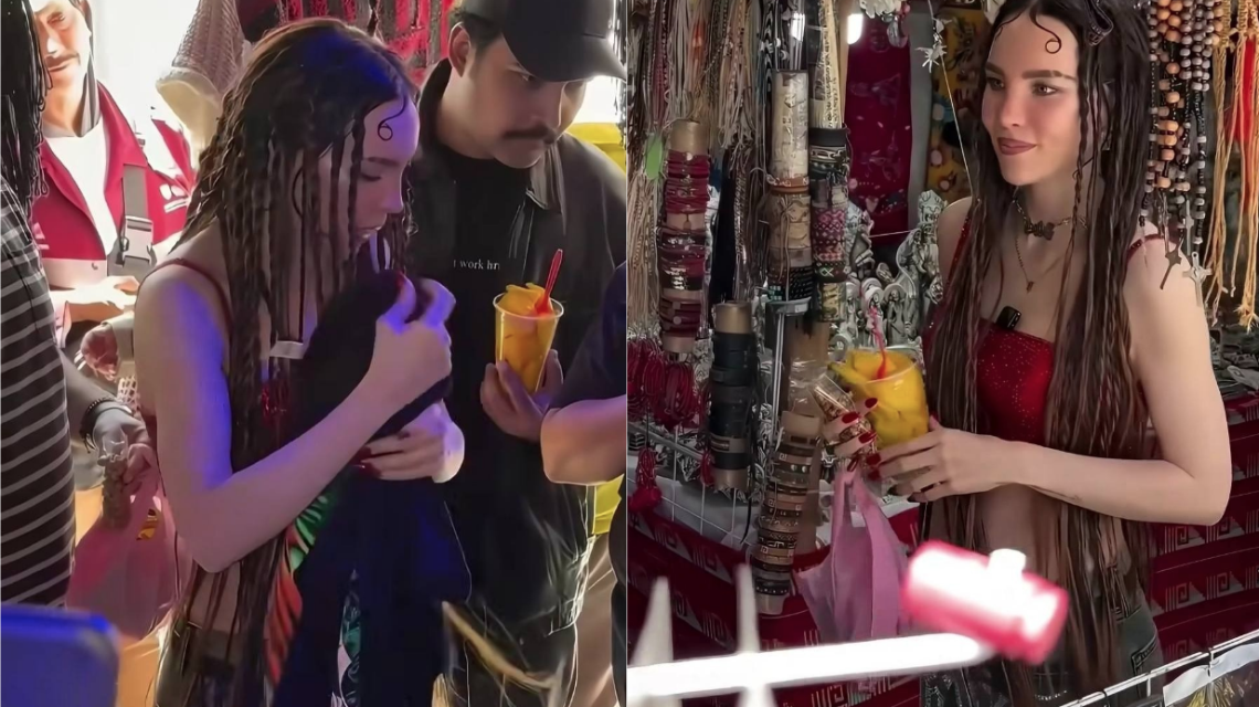 Belinda disfruta de un mango y cacahuates