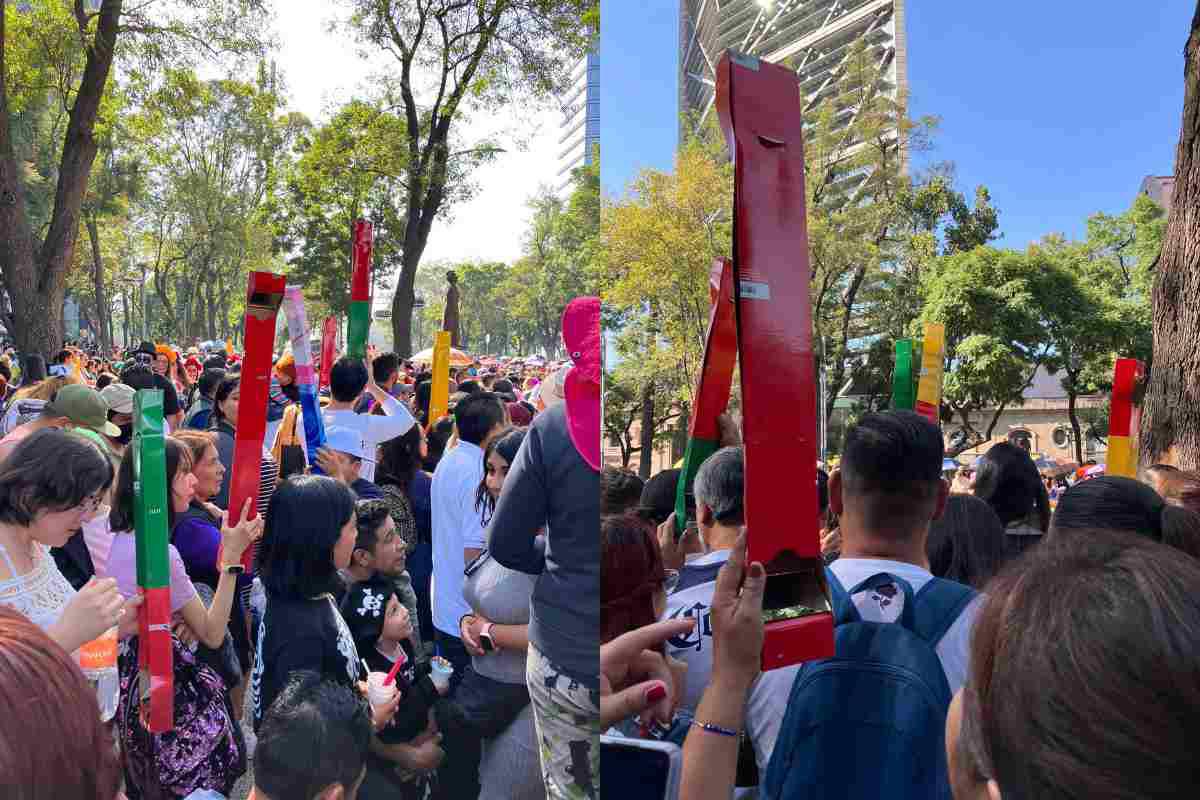 $!Algunas personas llevaron periscopios para ver el desfile entre tanta multitud.