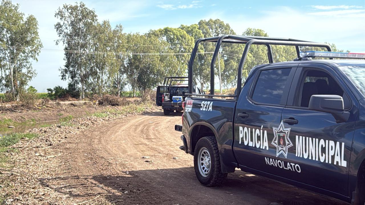 $!Hallan a un hombre asesinado a balazos flotando en canal de riego en Villa Juárez, Navolato