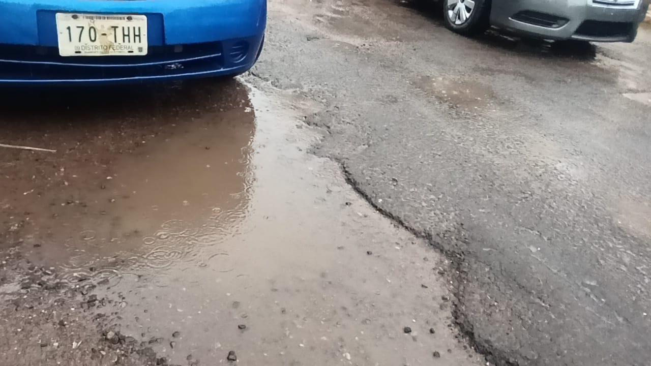 $!Lluvias dañan reencarpetado de avenida en Escuinapa