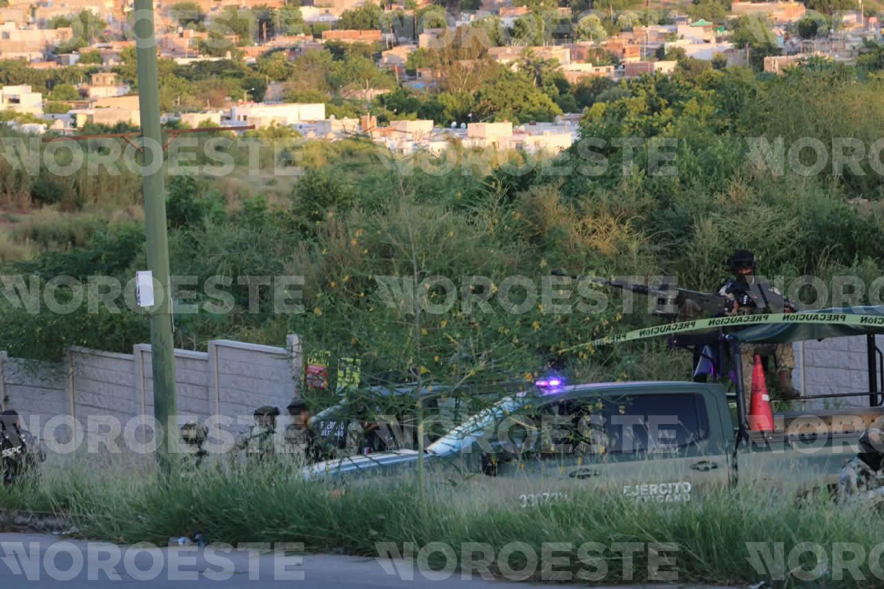 $!Hallan cuerpo decapitado acompañado de mensaje en San Isidro, en Culiacán