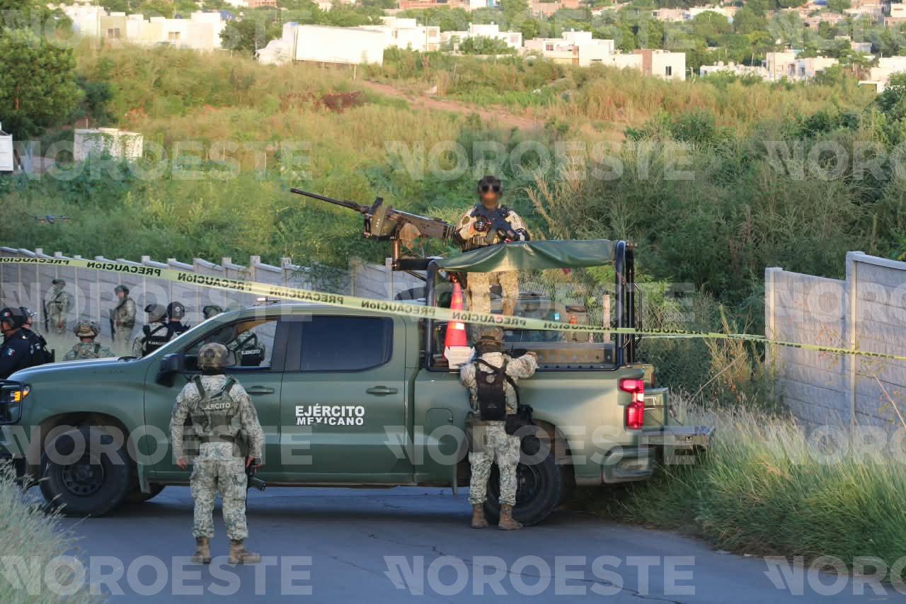 $!Hallan cuerpo decapitado acompañado de mensaje en San Isidro, en Culiacán