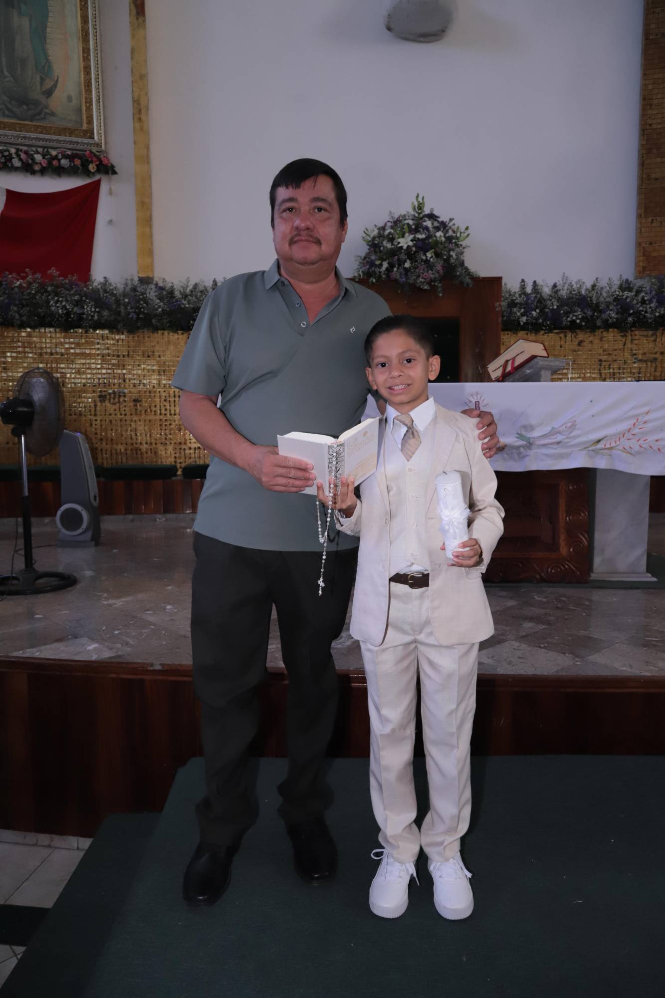 $!Saúl junto a su padrino José Luis Zamudio Rendón.