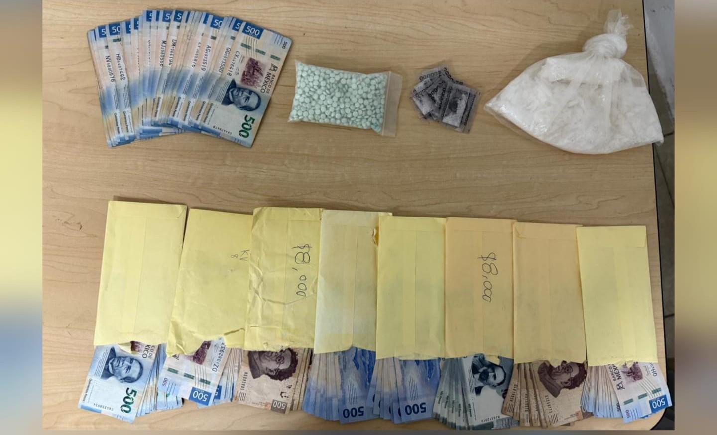 $!Detienen a dos personas armadas en Culiacán; aseguran armas, droga y dinero en efectivo