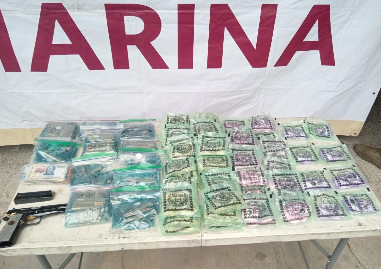 $!Aseguran arma y más de 3 mil dosis de droga dentro de una maleta en Mazatlán