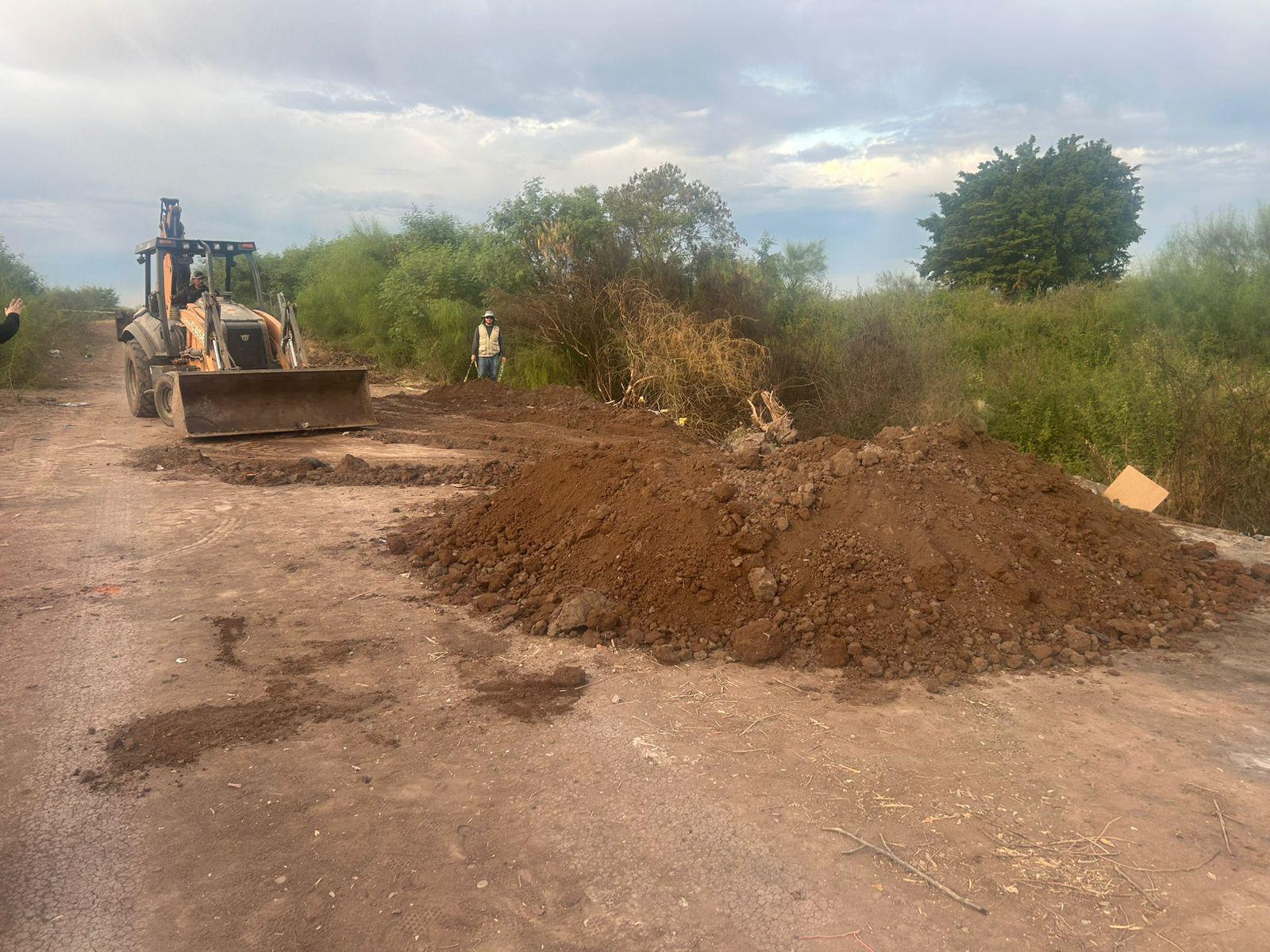 $!Suman 5 cuerpos localizados en fosas clandestinas en el dren Burrión, en Guasave