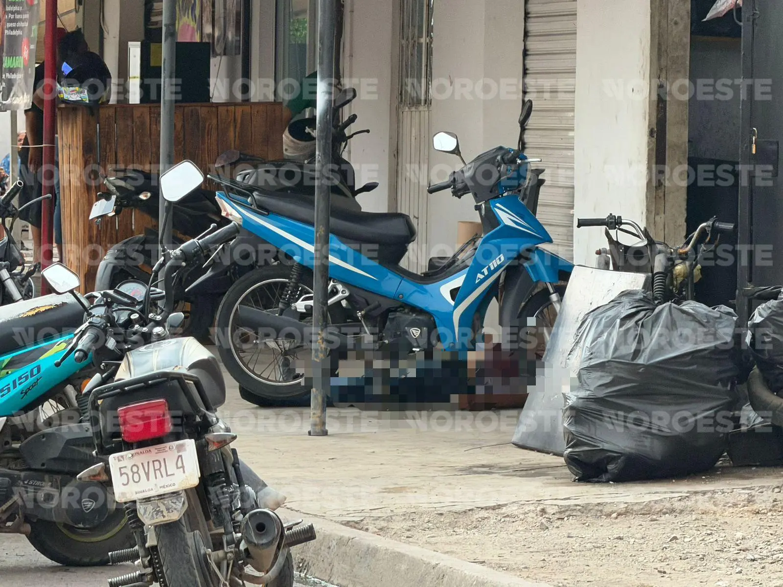 $!Matan a padre y sus dos hijos en ataque a un taller de motos de la Colonia Estero de Mazatlán