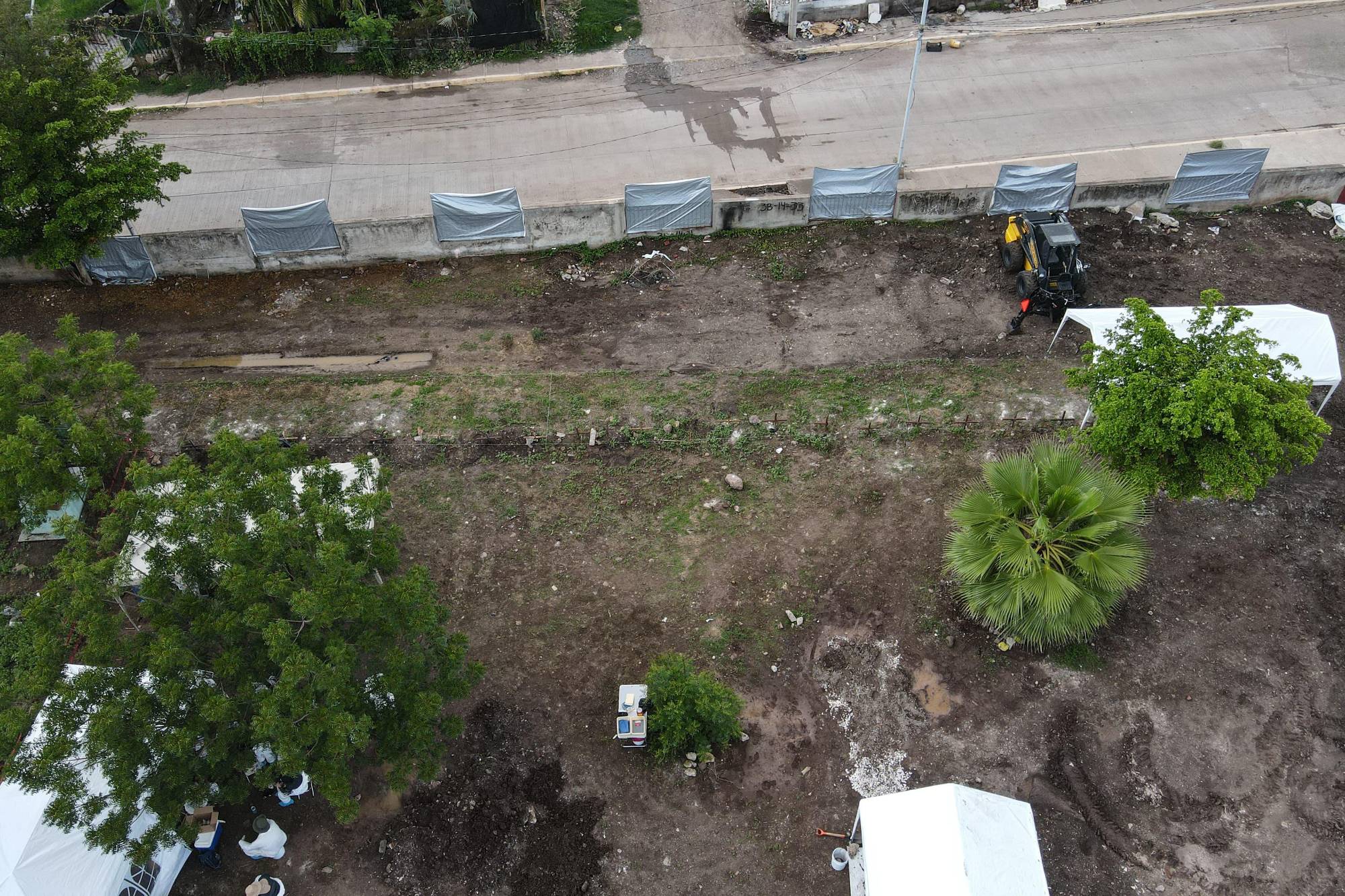 $!La necrópolis de los anónimos: en la fosa común del 21 de Marzo los cuerpos sin identificar están envueltos en hules negros