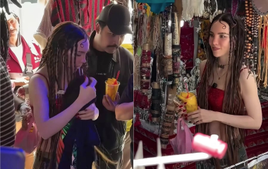 Belinda disfruta de un mango y cacahuates