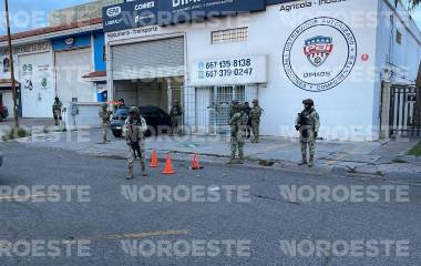 En el lugar fue localizado un vehículo con impactos de bala.