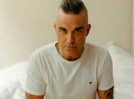 Robbie Williams anuncia su primer álbum con temas navideños