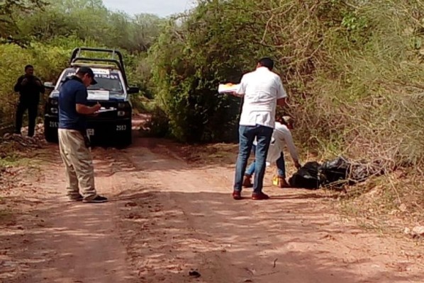 Hallan cuerpo de sujeto envuelto en hule negro y con impactos de bala cerca de Costa Rica