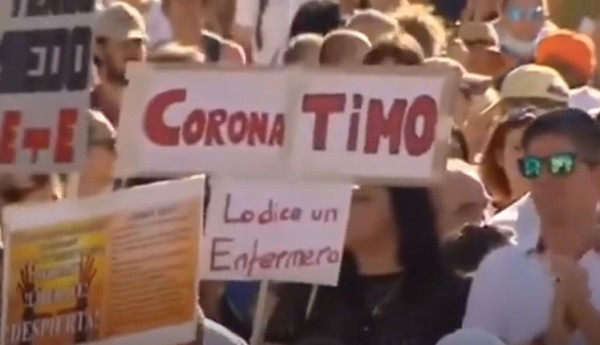 Protestan en España contra uso del cubrebocas