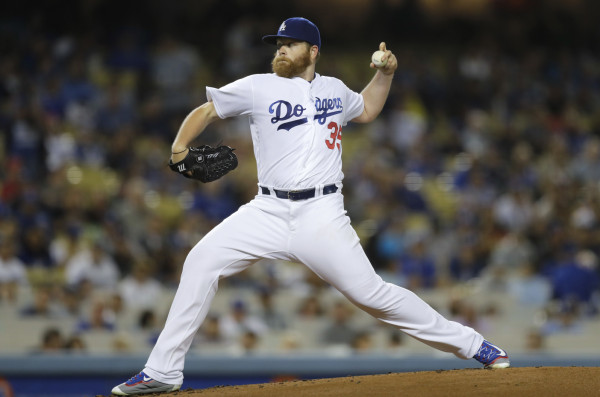 Cachorros adquieren a abridor Brett Anderson