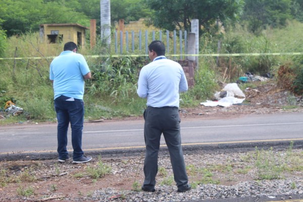 Hallan a hombre asesinado envuelto en hule, en Culiacán