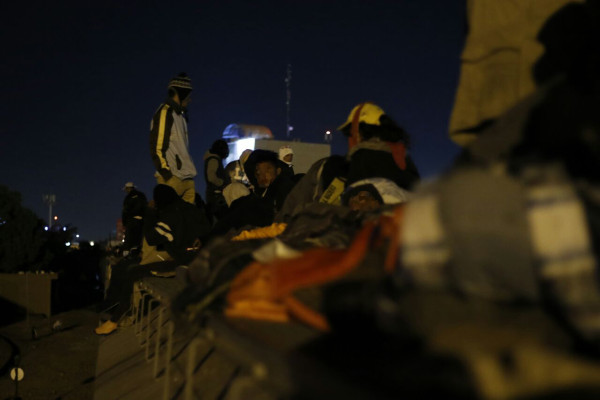 Amenazan a caravana de migrantes a su paso por Culiacán