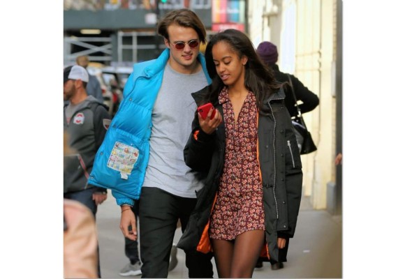 Rory Farquharsa y Malia Obama.