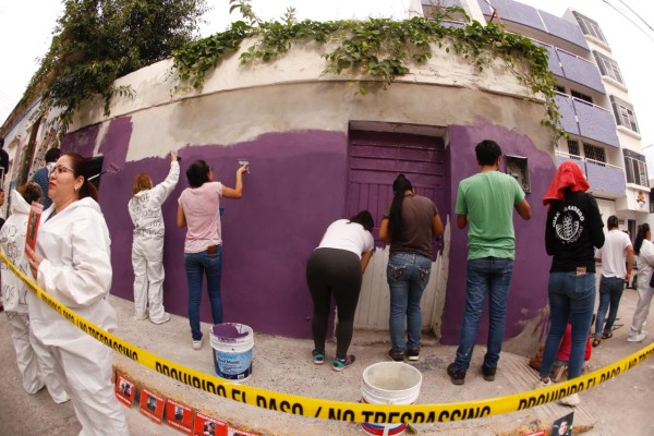 Ponen en marcha segunda pinta con rostros de desaparecidos en bardas del centro de Culiacán
