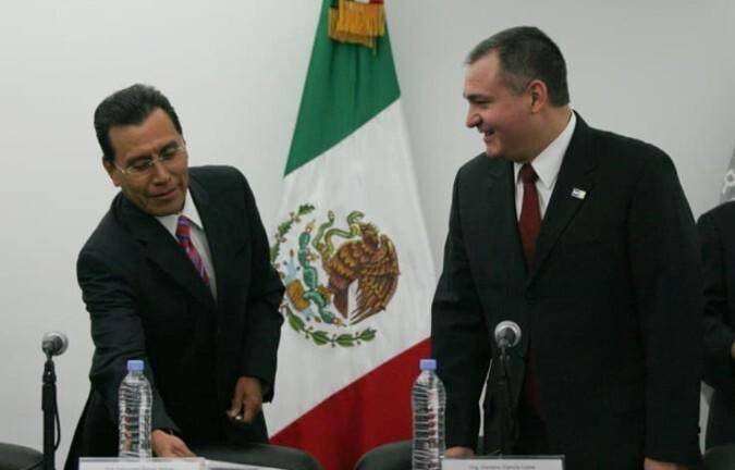 Genaro García Luna y Facundoi Rosaas.