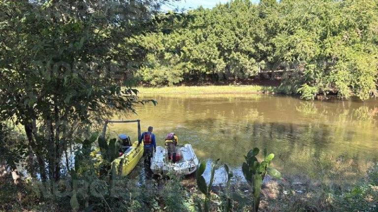 Rescatistas rastrean el dique Mariquita en busca del menor desaparecido en El Alto del Coyote.