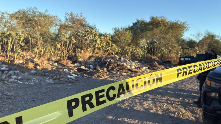 Autoridades acordonaron la zona del hallazgo en la carretera La 50, donde peritos realizaron las diligencias correspondientes.