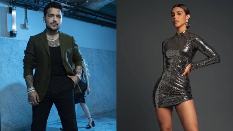 Mariana García sube al escenario con Christian Nodal durante un concierto.