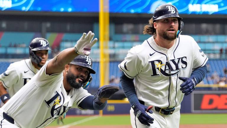 Ryan Vilade conectó un jonrón de tres carreras para el triunfo de los Rays.