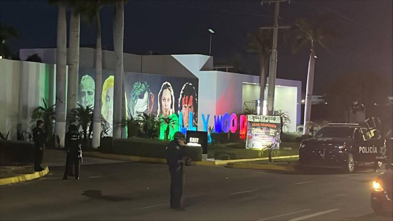 Policías federales y estatales mantienen asegurado el motel donde se reportó el incendio y las detenciones.