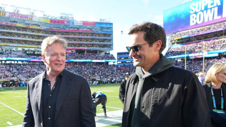 Roger Federer (der.) a su llegada al Levi’s Stadium.