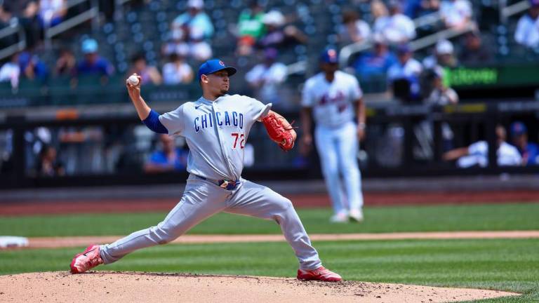 Assad aprovecha la explosión ofensiva de los Cachorros y vence a los Mets.