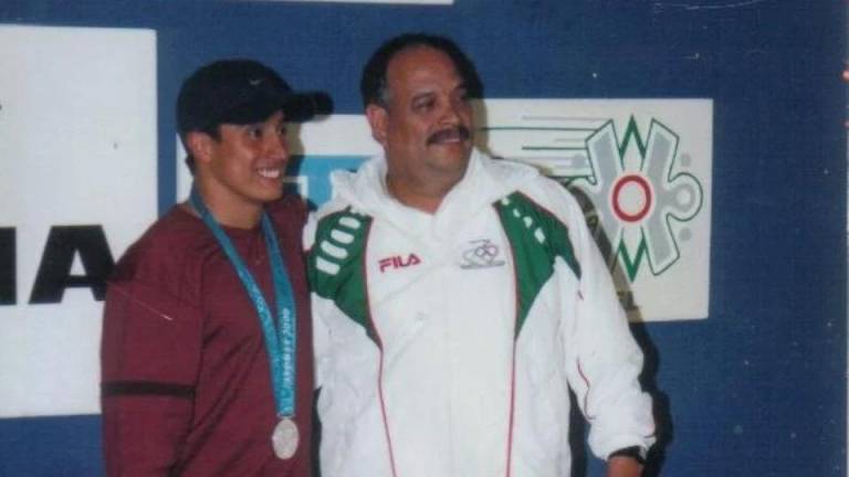 Jorge Rueda (der.) llevó a Fernando Platas a ganar una medalla olímpica.