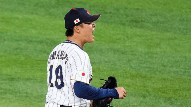 Yoshinobu Yamamoto viene de lanzar con Japón en el Clásico Mundial de Beisbol.