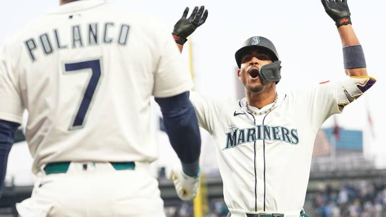 Julio Rodríguez y los Marineros de Seattle celebran el título divisional.