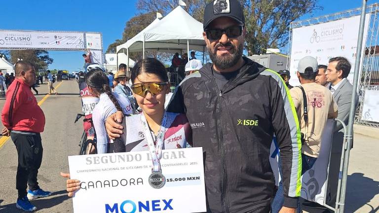 Hanna Enciso y su entrenador José Manuel García.