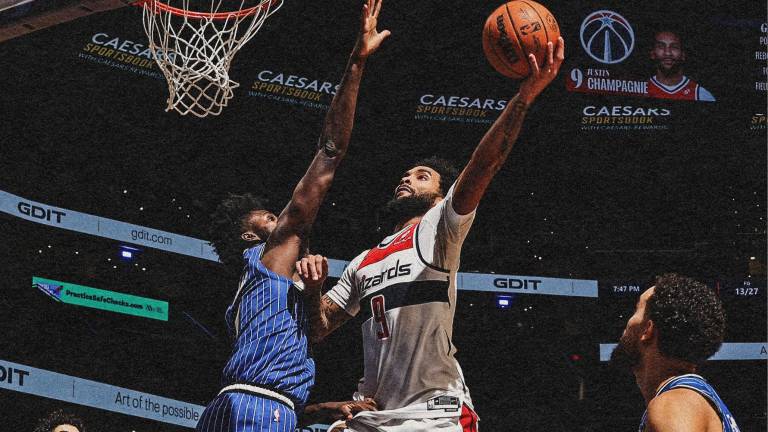 Los Wizards se apoyaron en una buena ofensiva final para imponerse al Magic.