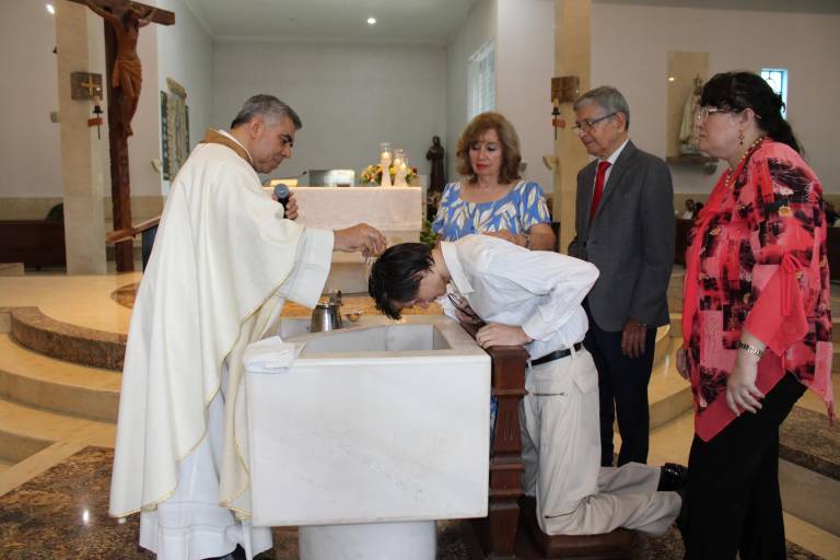 Ya son fieles católicos Eugenio y Vladimir Kolesnikov