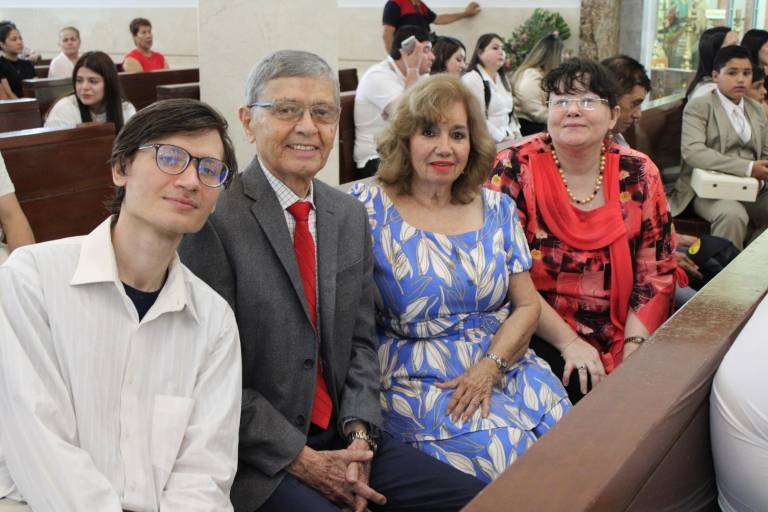 Ya son fieles católicos Eugenio y Vladimir Kolesnikov