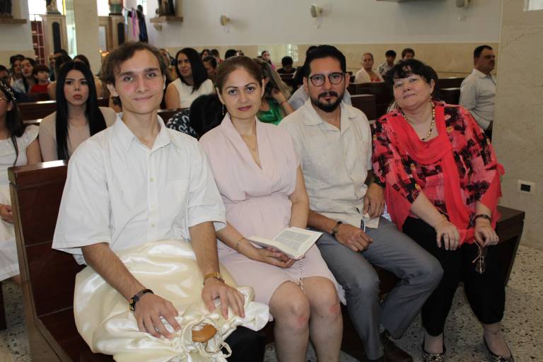 Ya son fieles católicos Eugenio y Vladimir Kolesnikov