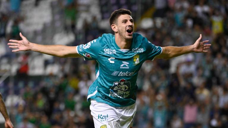 Lucas Di Yorio celebra el gol con el que le dio el triunfo al León.