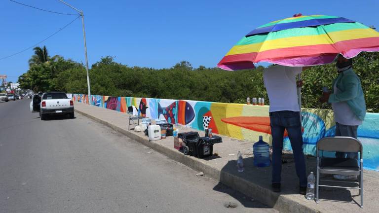 Con arte urbano embellecen puente del Estero del Infiernillo