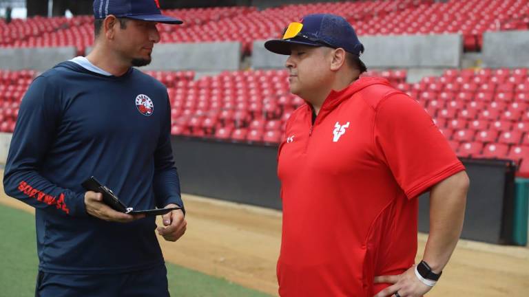 Édgar Osuna (izquierda)