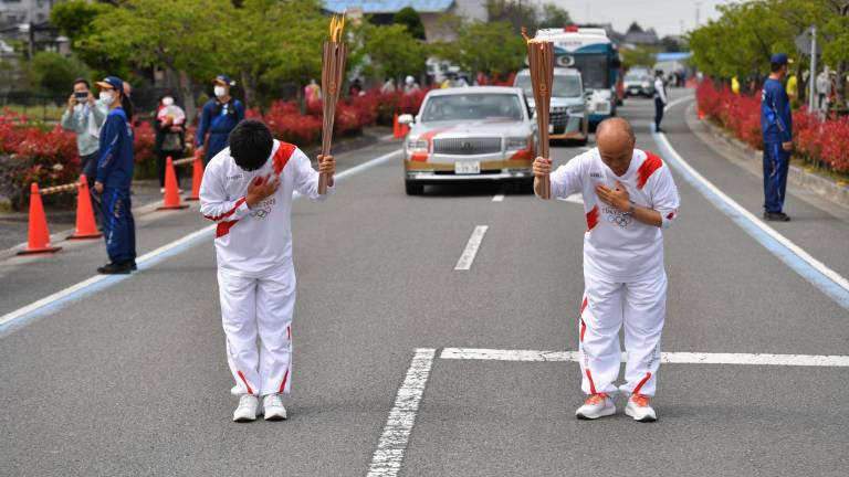 La flama olímpica en su paso por Ehime este jueves.