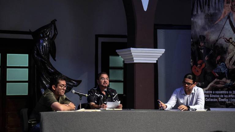 Juan Antonio Fernández y César Burgos Dávila, acompañados por Ricardo Rodríguez.