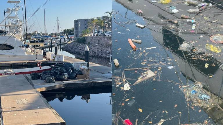 El agua y pasillos del muelle donde amarran los yates de la Marina Mazatlán se muestra sucias.