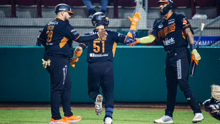 Naranjeros gana por la mínima.