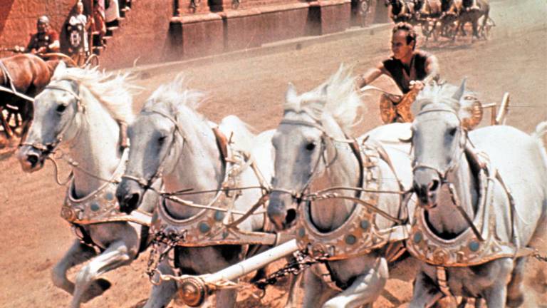 Charlton Heston en “Ben Hur” como auriga de un carruaje.