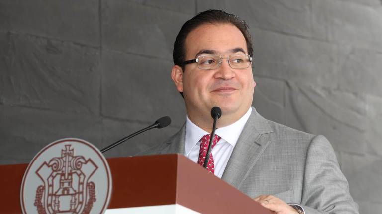 Javier Duarte cuando estaba como Gobernador de Veracruz atendiendo un evento del Tribunal Federal de Justicia Administrativa.