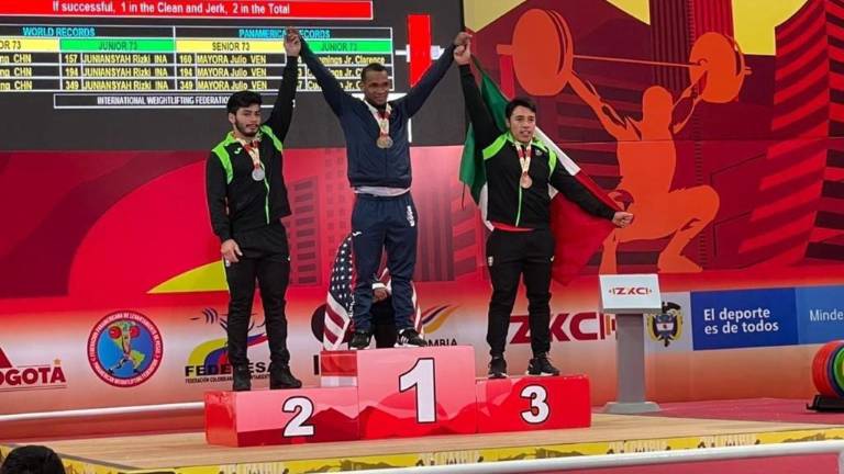 Jorge Adán Cárdenas Estrada (izq.) logra tres preseas panamericanas.